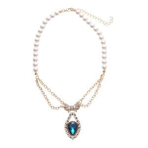 Vintage pearl necklace with golden chain, crystal bow, and blue teardrop pendant