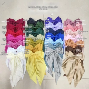 Detail showcasing dimensions and 28 color options for large satin bow hair clips