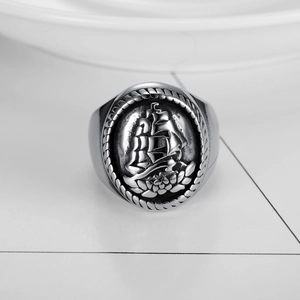 Vintage silver sailboat signet ring with engraved nautical relief for men