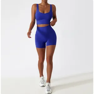 Detail view of royal blue high waist yoga shorts with practical side pockets for fitness