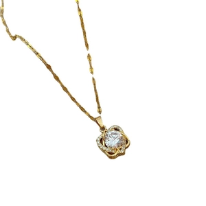 Elegant gold titanium steel necklace with hollow floral pendant and sparkling cubic zirconia