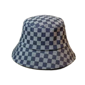 Denim checkerboard bucket hat for women in navy and white with a vintage casual style