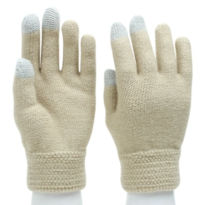 Detail of knit gloves with touch screen fingertips and thick ribbed cuffs on model