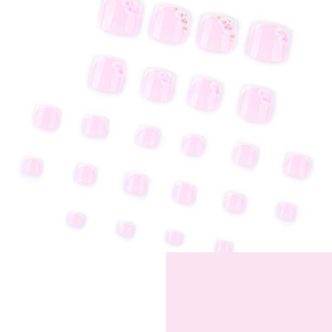 Pink French ombre press-on toenails with 3D floral accents and golden pearl details