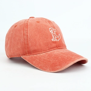 Detailed close-up of a vintage washed cotton baseball cap with white dog embroidery