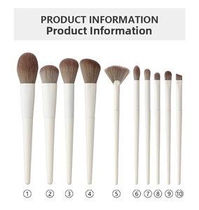 Detailed set of 10 professional makeup brushes with cream handles and brown soft bristles