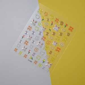 Detail of 5D jelly relief nail art stickers featuring 3D rabbit and floral patterns