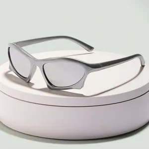 Y2K futuristic silver wrap-around kids sunglasses with polarized lenses on a display stand