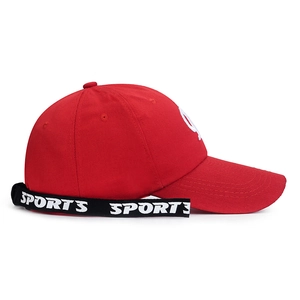 Red baseball cap with a long black SPORTS ribbon and white 3D embroidery on the front