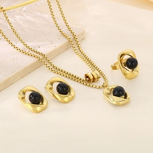 Detailed set of gold stainless steel necklace, earrings and ring with black pearls