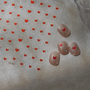 Nail art stickers Co-537 with red hearts and white rays on nude pink shimmer nails