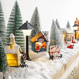 Luminous Christmas village set with miniature resin candy store and snow-covered trees