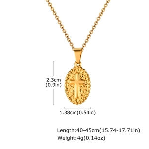 Detail showing dimensions of vintage oval cross pendant with hammered texture on gold chain