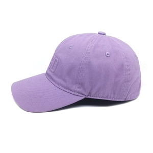 Detail of light purple cotton twill baseball cap showing side ED letter embroidery