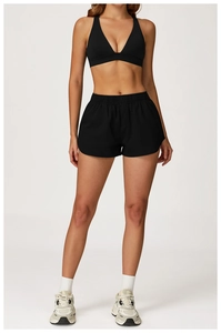 Détail de l'ensemble de sport noir taille haute en tissu élastique respirant pour yoga