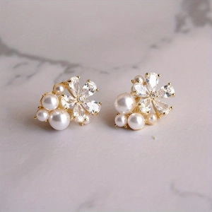 Sparkling floral stud earrings with white pearls and marquise cubic zirconia in gold finish