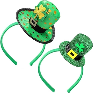 Close-up of green sequin St. Patrick's Day headbands with shamrock mini top hats