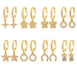 Set of 8 gold-plated hoop earrings with geometric pendants and cubic zirconia stones