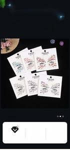 Detailed view of assorted acrylic facial gemstone stickers for music festival makeup