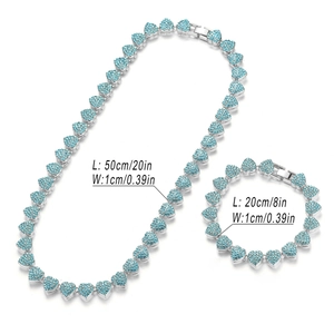 Silver Cuban link set with light blue heart rhinestones and detailed size measurements