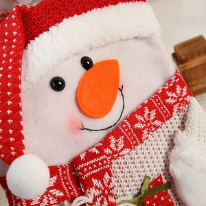 Christmas snowman gift bag made of red knit fabric with a cute 3D felt nose decoration
