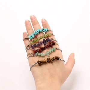 Detail view of multi-colored natural stone beads on thin adjustable stainless steel chains