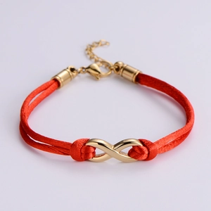 Red braided rope bracelet with golden infinity symbol and adjustable chain for women
