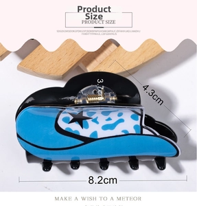 Denim hat shape hair claw clip product dimensions showing 8.2cm length and blue star pattern