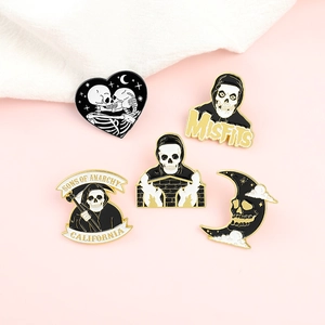 Set of five creative black enamel gothic pins featuring skull and moon heart designs