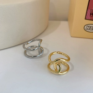 Minimalist double layered geometric open rings in gold and silver finish on textured base