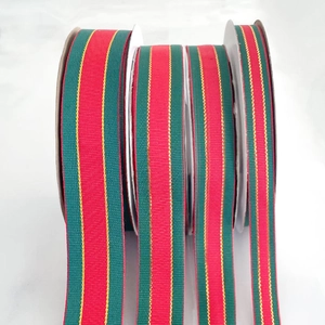Red and green Christmas ribbon with gold stripes for DIY gift wrapping and decorations
