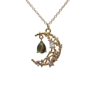Golden crescent moon necklace with sparkling star zircon and a teardrop pendant