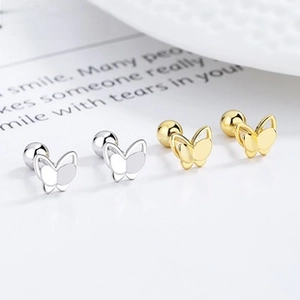 Detailed view of 925 sterling silver butterfly stud earrings in gold and silver finishes