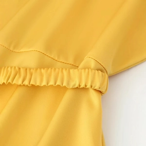 Elegant yellow satin midi dress featuring a waist belt and delicate elastic pleat details
