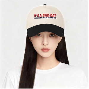 Close-up of the humor print text on this two-tone baseball cap with clean stitching