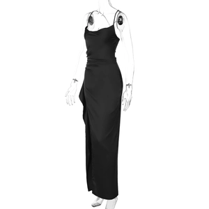 Detail view of black satin slip dress showing side slit and slim fit on a mannequin