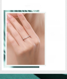 Detail of s925 silver eternity ring with colorful cubic zirconia pavé setting