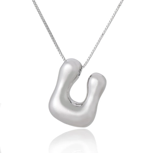 Polished silver U-shaped alphabet pendant with a Venetian box chain on white background