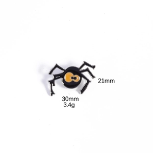 Detailed close-up of a spider enamel brooch with dimensions 30mm x 21mm and 3.4g weight