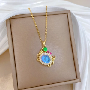 Luxurious titanium steel necklace with colorful crab pendant featuring blue gemstone