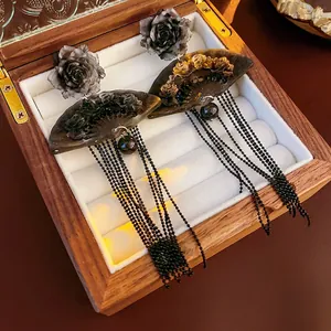 Gothic style black rose earrings with fan-shaped hollow frame and long beaded tassels