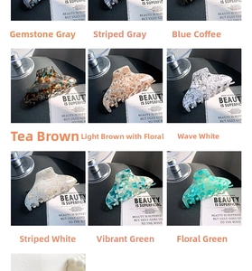 Detailed grid of large acetate claw clips in marble and floral patterns with nine colors