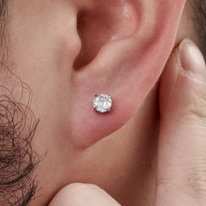 Sparkling zircon stainless steel screw back stud earring worn on model's earlobe