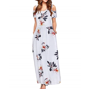 Detail of white floral maxi dress featuring cold-shoulder sleeves and side pockets