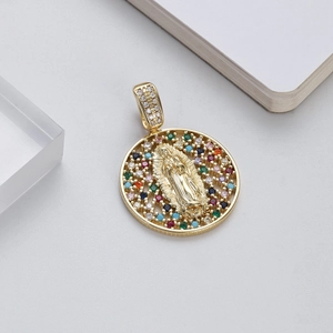 Close-up of 14K gold Virgin Mary pendant with colorful zircon stones and crystals