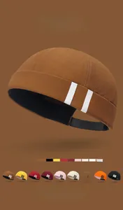 Detail showing eight color variants of the brimless cap with three white side stripes