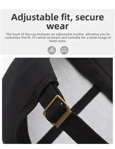 Detail der verstellbaren Metallschnalle und des Stoffbandes einer schwarzen Kappe