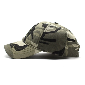 Detailed side view of camouflage baseball cap showing fabric texture and side woven label