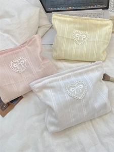 Chic bow makeup bags in pink, yellow and white with lace details and top zipper