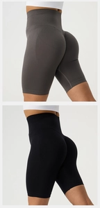 Detailed close-up of high-waisted seamless ribbed knit yoga shorts with tummy control effect